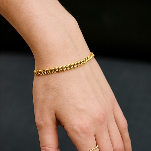 14k gold filled permanent bracelet on the young woman wrist